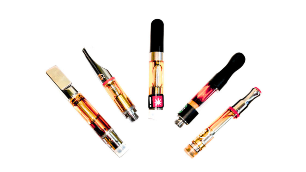 Vapes on white floor.